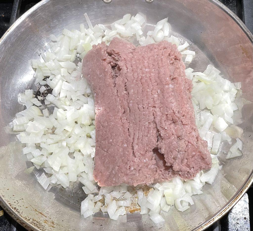 ground meat on onion