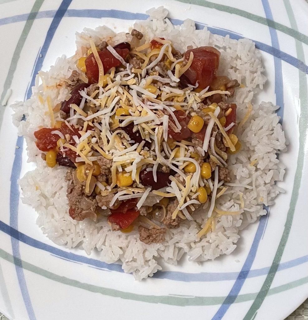 Chili on rice with cheese