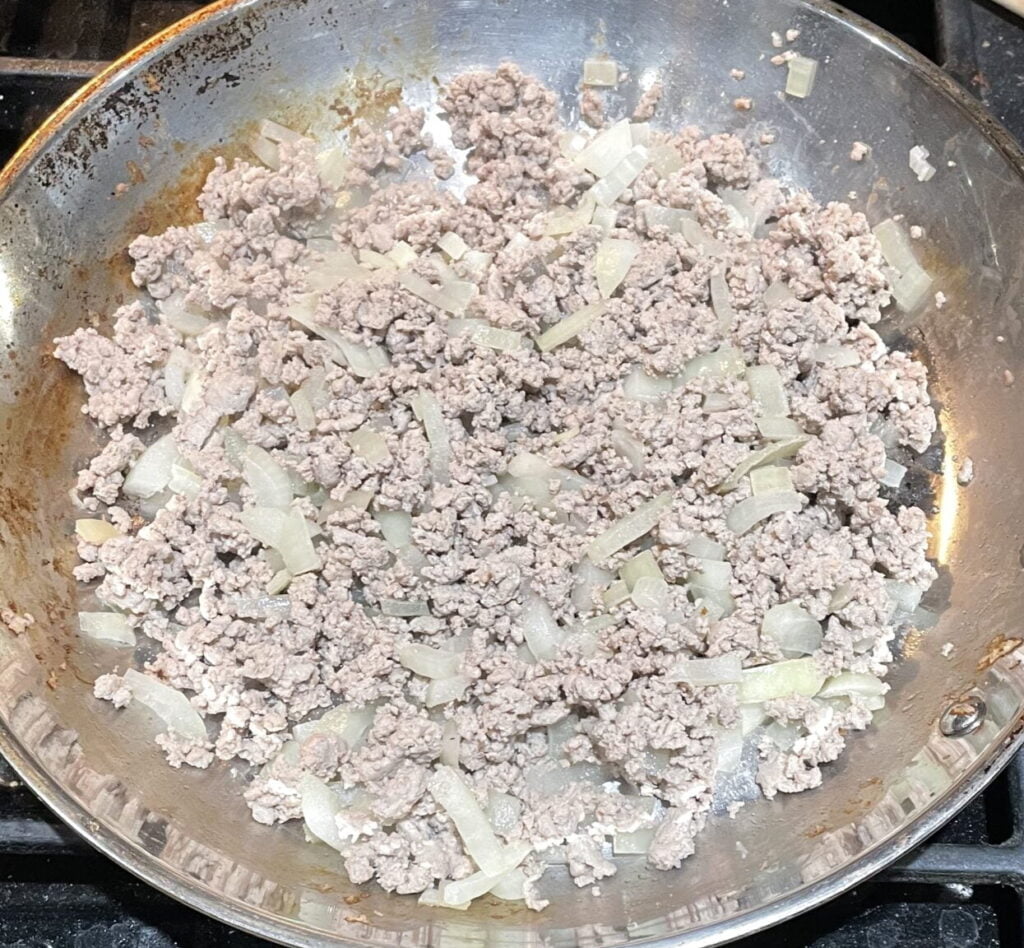 meat and diced onions cooked