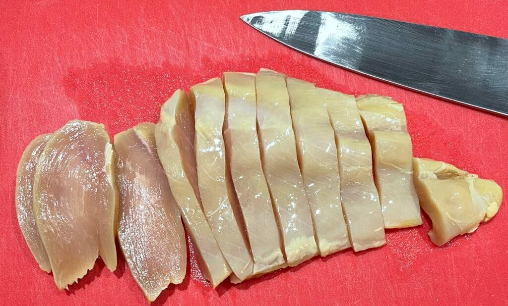 cut chicken into strips